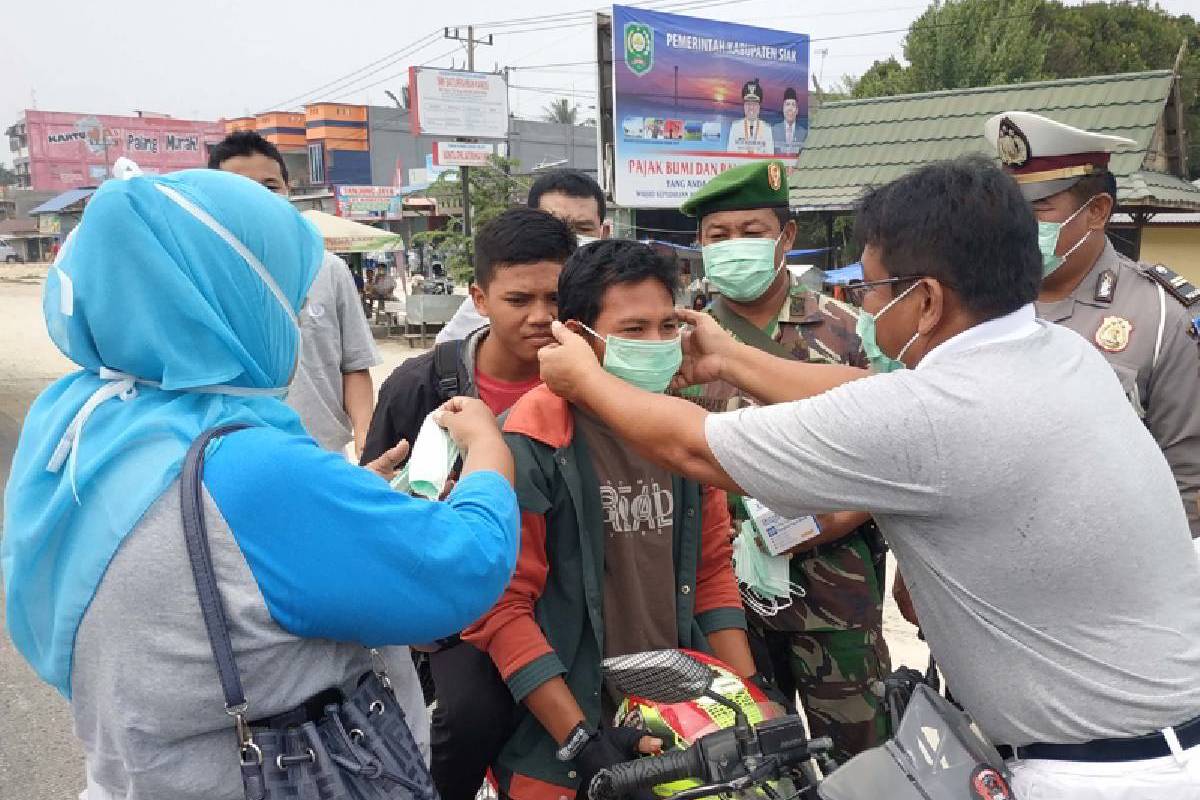 Masker untuk Korban Kabut Asap di Riau