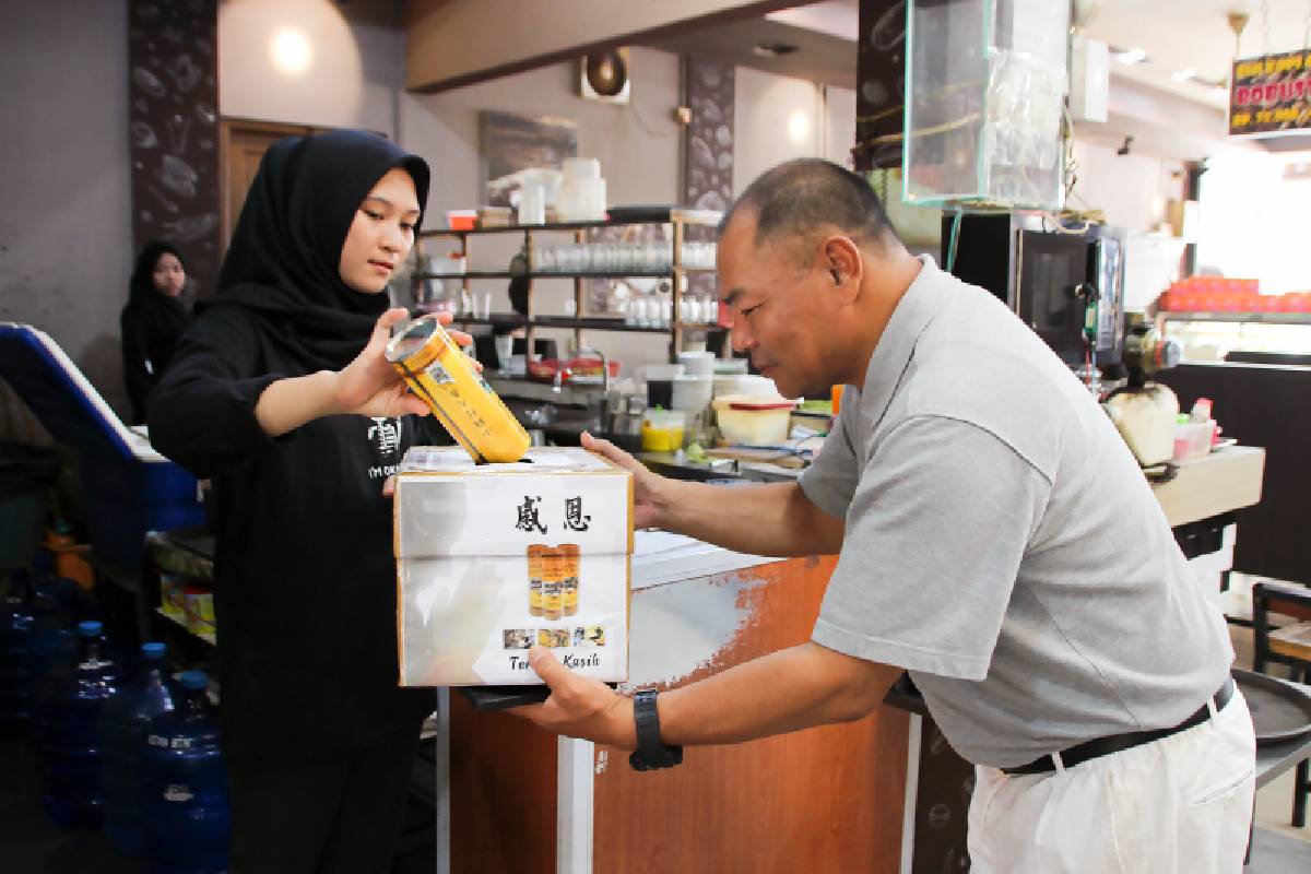 Mengembangkan Cinta Kasih Melalui Celengan Bambu Tzu Chi