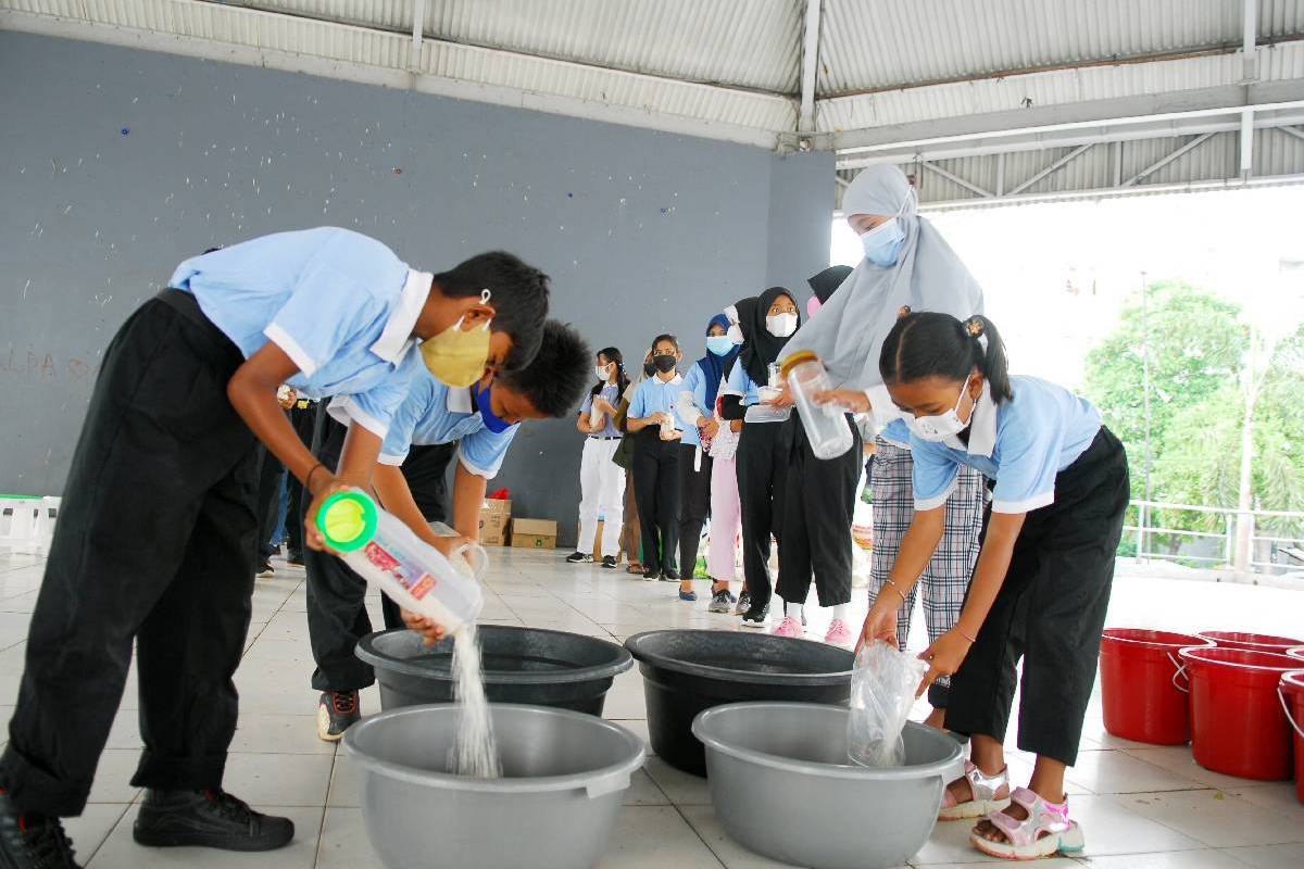 Ajakan Berbagi dari Tabungan Sesendok Beras