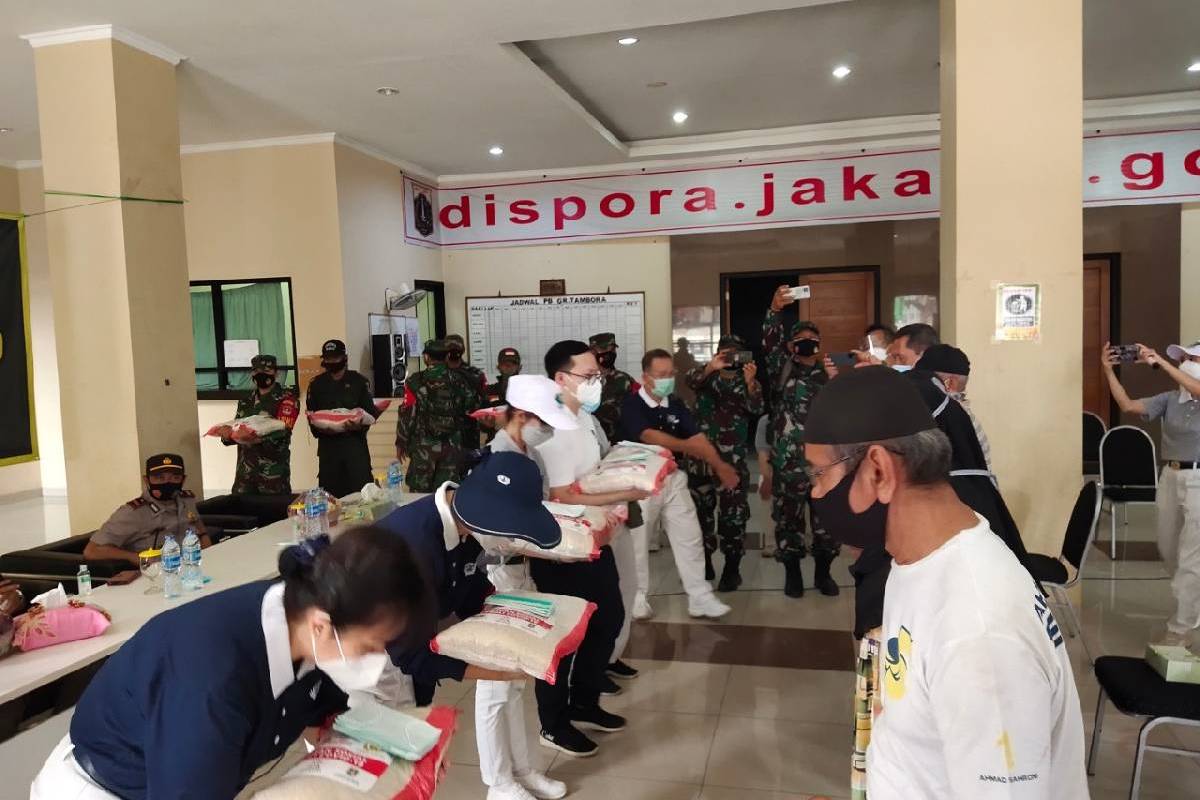 400 Paket Paket Beras dan Masker untuk Tambora