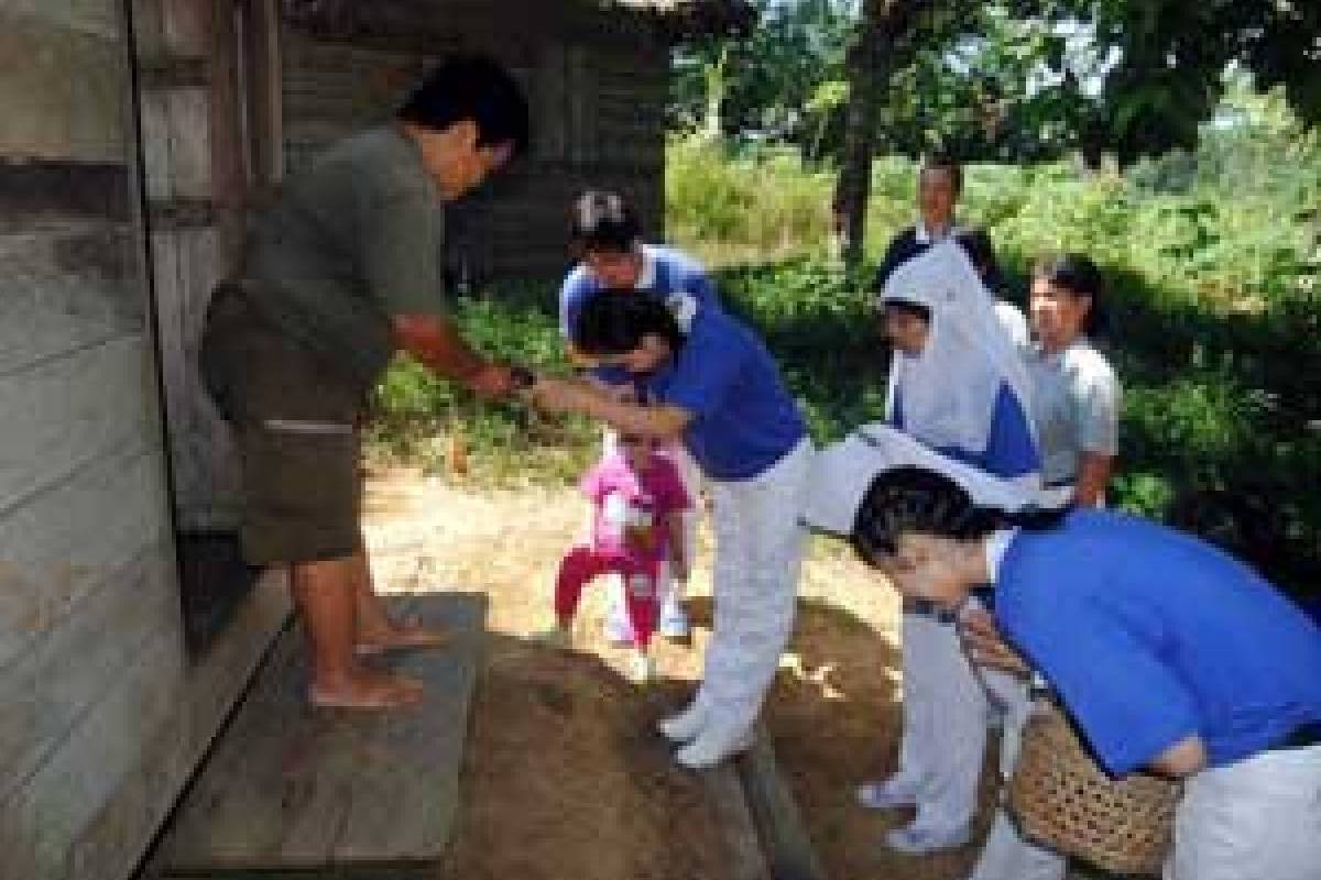 Berbagi Bacang Bagi Penerima Bantuan